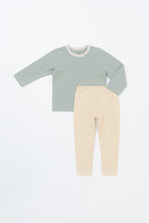 Front view of the Avauma Cloud Ribbed Setup in Sage Leaf – a children’s outfit featuring a soft sage-colored top and cream ribbed leggings for a comfortable look